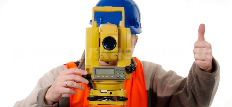 геодезист с теодолитом
